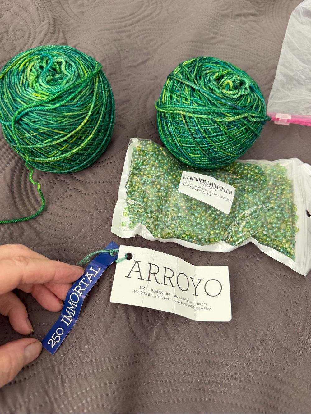 Malabrigo Immortal Green Hand-Dyed Yarn - Vibrant Green yarn and beads